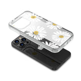 Applying the Happy Daisies Mood Diamond Series Case to the Apple iPhone 13.