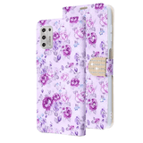 Purple Flowers Diamond Wallet Case with Bedazzled Closure Strap for Motorola Moto G Stylus (2021).
